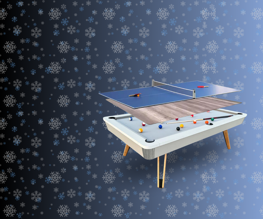 Multi-game table with ping pong and pool components on a decorative background with snowflakes.