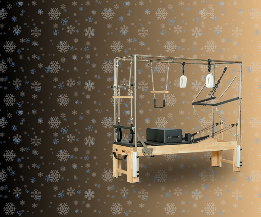 Wooden Pilates reformer machine with attachments on a patterned background